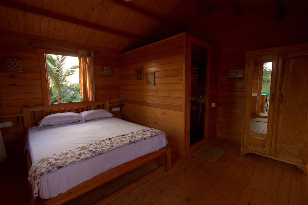 Pele'S Windsong Wood Cottage On The Beach ベナウリム 部屋 写真